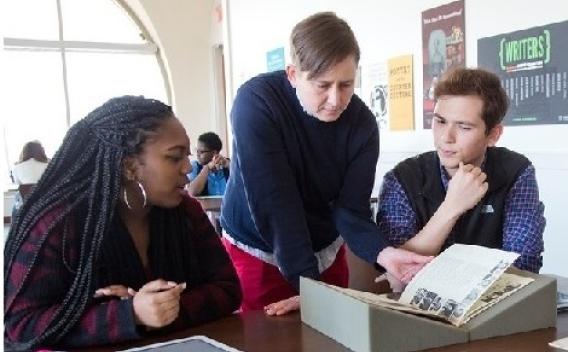 Image of students in the archive