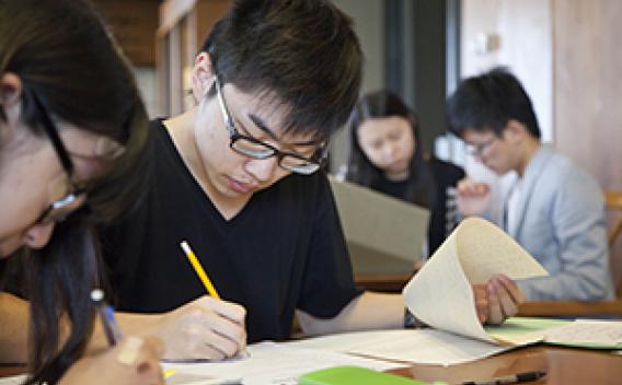 Image of students in the archive