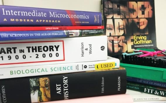 Several book gifts with titles such as "Art in Theory 1900-2000," "Intermediate Microeconomics," and "Biological Science."