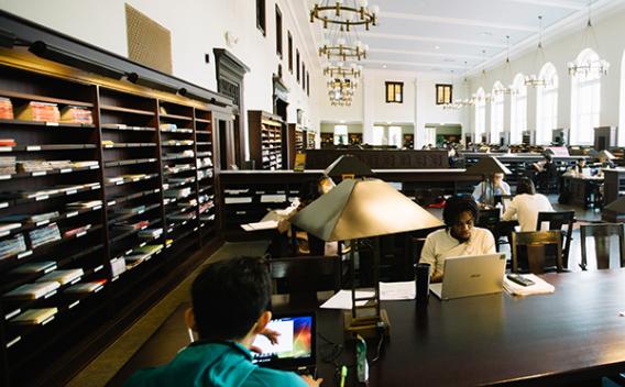 Students studying at tables in the Matheson Reading Room